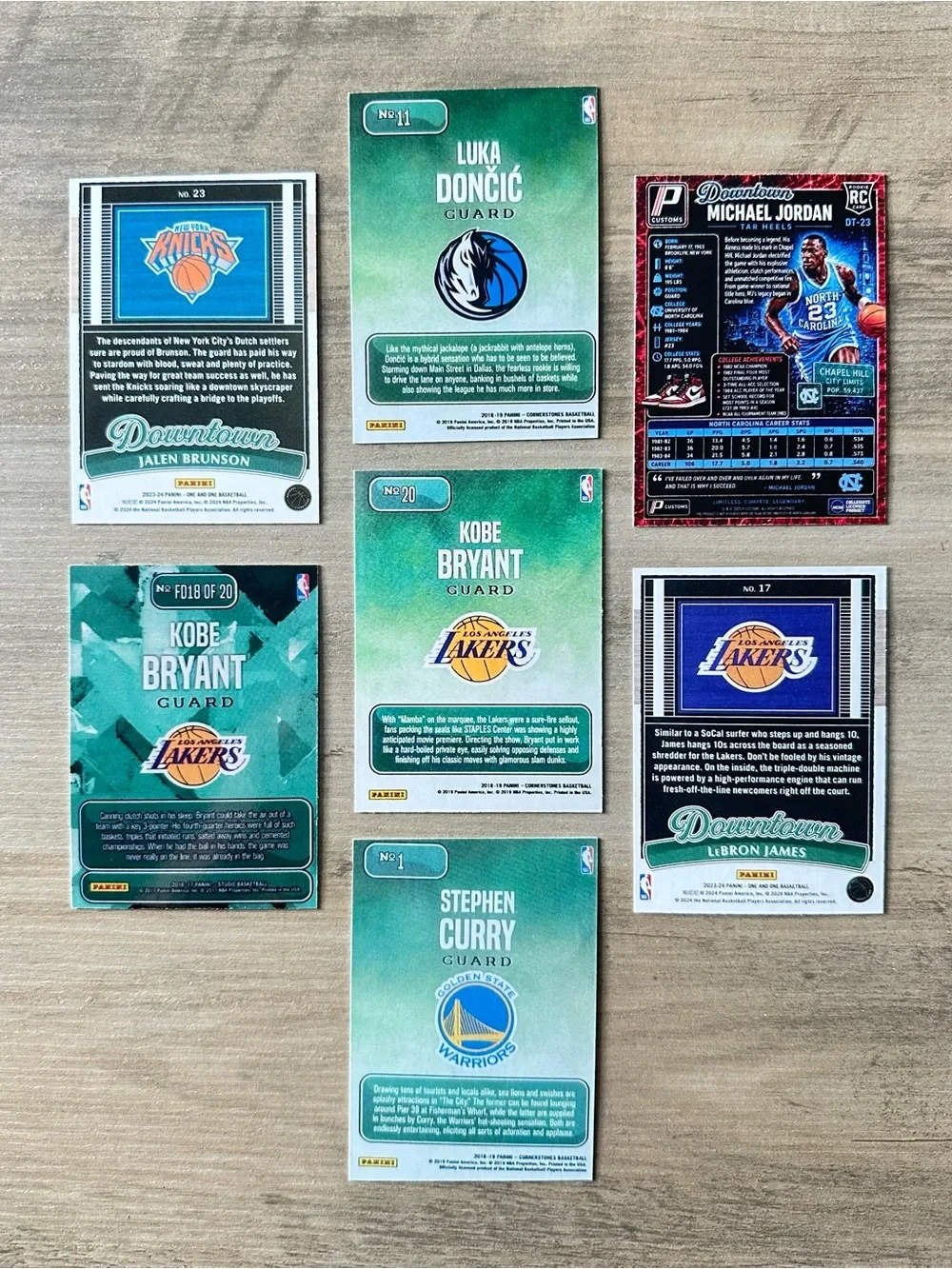 NBA Downtown Lot of (7) Jordan, Kobe, LeBron, Curry, etc… Novelty Cards.